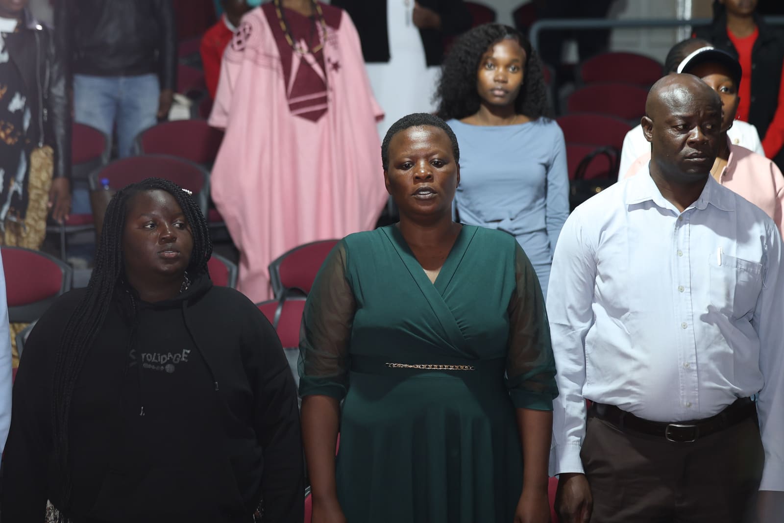 Families and guests standing at the SPPG Kenya ceremony
